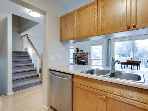 115-133 Wyndham Crescent, Kelowna, BC - Indoor Photo Showing Kitchen With Double Sink