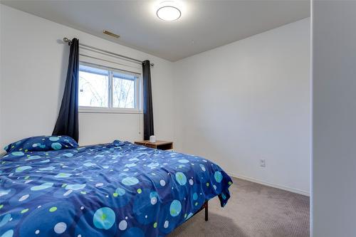 115-133 Wyndham Crescent, Kelowna, BC - Indoor Photo Showing Bedroom