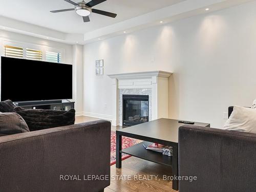 1570 Leger Way, Milton, ON - Indoor Photo Showing Other Room With Fireplace