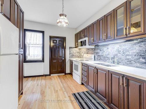 Main-303 Lauder Ave, Toronto, ON - Indoor Photo Showing Kitchen With Double Sink