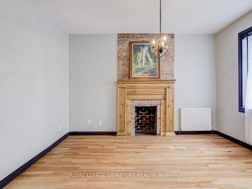 Main-303 Lauder Ave, Toronto, ON - Indoor Photo Showing Other Room With Fireplace