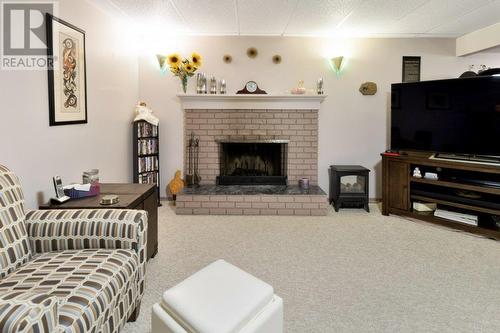 3788 Highland Drive, Prince George, BC - Indoor Photo Showing Living Room With Fireplace