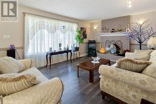 3788 Highland Drive, Prince George, BC - Indoor Photo Showing Living Room With Fireplace