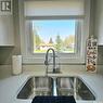 315 Macarthur Drive, Prince Albert, SK  - Indoor Photo Showing Kitchen With Double Sink 