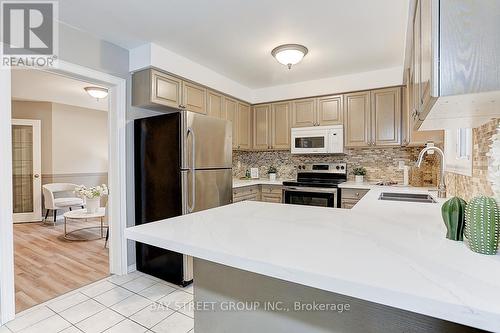 26 Mcivor Street, Whitby, ON - Indoor Photo Showing Kitchen With Double Sink