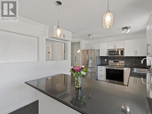 11 Ketza Road, Whitehorse, YT - Indoor Photo Showing Kitchen With Upgraded Kitchen