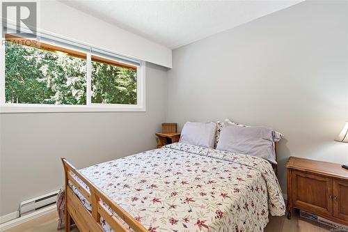 Bedroom - 5851 Alpha Cir, Nanaimo, BC - Indoor Photo Showing Bedroom