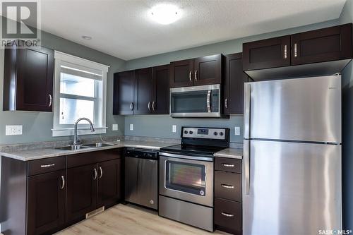 2074 Pasqua Street, Regina, SK - Indoor Photo Showing Kitchen With Double Sink