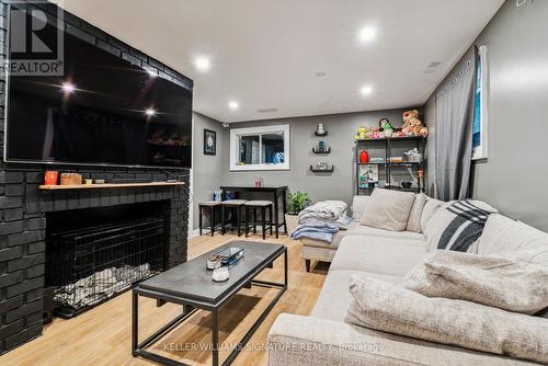 3716 Maple Grove Road, Innisfil, ON - Indoor Photo Showing Living Room With Fireplace