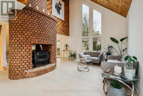 3716 Maple Grove Road, Innisfil, ON - Indoor Photo Showing Living Room With Fireplace