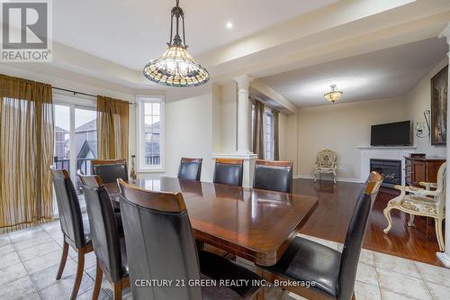 2010 Celeste Street, Innisfil, ON - Indoor Photo Showing Dining Room With Fireplace