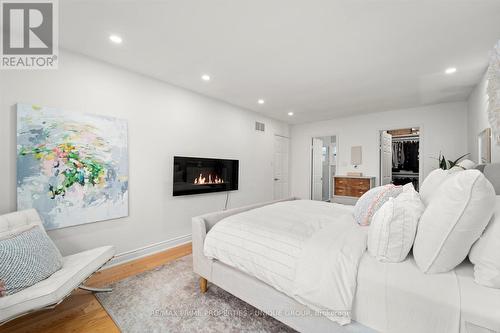 293 Mississaga Street, Oakville, ON - Indoor Photo Showing Bedroom With Fireplace