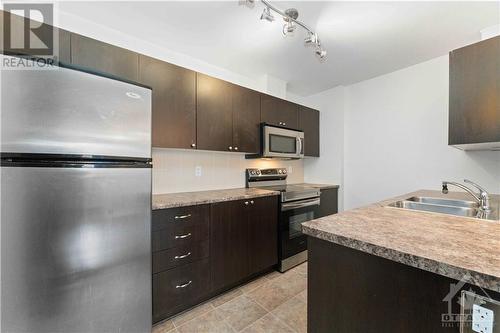 920 White Alder Avenue Unit#C, Ottawa, ON - Indoor Photo Showing Kitchen With Stainless Steel Kitchen With Double Sink