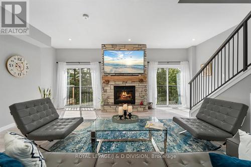 15 Malone Road, Georgina, ON - Indoor Photo Showing Living Room With Fireplace