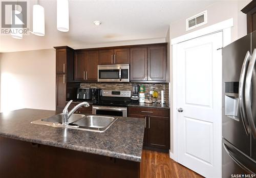 2045 Nicholson Road, Estevan, SK - Indoor Photo Showing Kitchen With Stainless Steel Kitchen With Double Sink