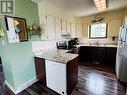 709 99 Avenue, Dawson Creek, BC  - Indoor Photo Showing Kitchen With Double Sink 