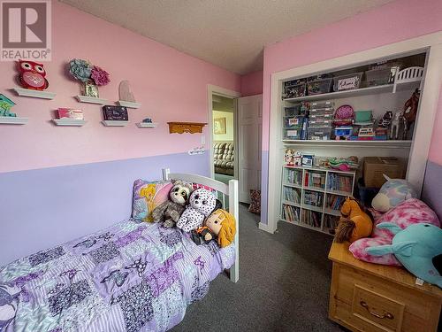 709 99 Avenue, Dawson Creek, BC - Indoor Photo Showing Bedroom