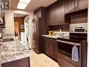 13715 209 Road, Dawson Creek, BC  - Indoor Photo Showing Kitchen 
