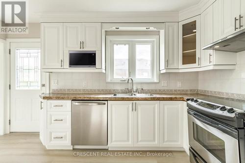 101 Rustic Road, Toronto, ON - Indoor Photo Showing Kitchen With Double Sink