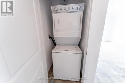 521 - 2490 Old Bronte Road, Oakville, ON - Indoor Photo Showing Laundry Room