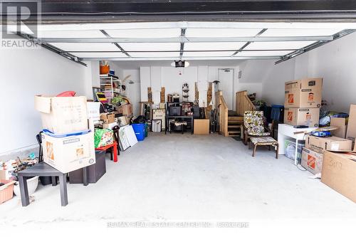128 Burnhamthorpe Road E, Oakville, ON - Indoor Photo Showing Garage