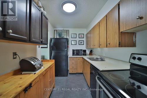 112 - 40 Sunrise Avenue, Toronto, ON - Indoor Photo Showing Kitchen With Double Sink