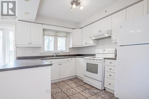 16 Donewen Court, Toronto, ON - Indoor Photo Showing Kitchen With Double Sink