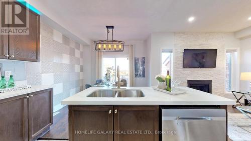 131 Laurendale Avenue, Georgina, ON - Indoor Photo Showing Kitchen With Fireplace With Double Sink