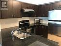 907 - 30 Clegg Road, Markham, ON  - Indoor Photo Showing Kitchen With Stainless Steel Kitchen With Double Sink 