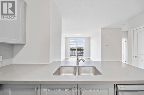509 - 5917 Main Street, Whitchurch-Stouffville, ON - Indoor Photo Showing Kitchen With Double Sink