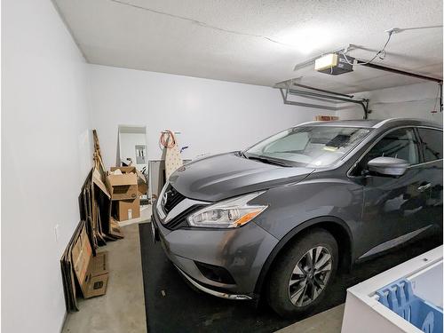 103 - 825 Merry Creek Road, Castlegar, BC - Indoor Photo Showing Garage