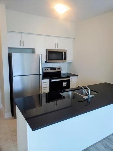 16 Concord Place|Unit #537, Grimsby, ON - Indoor Photo Showing Kitchen With Stainless Steel Kitchen With Double Sink