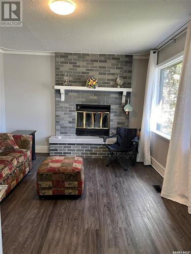 248 15Th Street W, Prince Albert, SK - Indoor Photo Showing Living Room With Fireplace