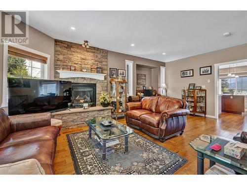 1843 Schunter Drive, Lumby, BC - Indoor Photo Showing Living Room With Fireplace