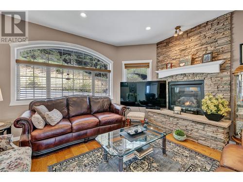 1843 Schunter Drive, Lumby, BC - Indoor Photo Showing Living Room With Fireplace