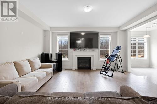 588 Queen Mary Drive, Brampton, ON - Indoor Photo Showing Living Room With Fireplace