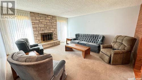 3450 Jordan Drive, Prince Albert, SK - Indoor Photo Showing Living Room With Fireplace