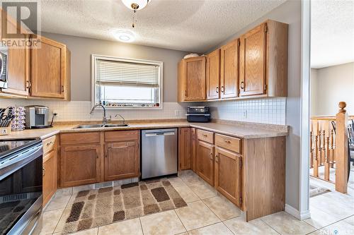 1341 Irving Avenue, Moose Jaw, SK - Indoor Photo Showing Kitchen With Double Sink