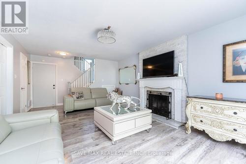 42 Floribunda Crescent, Brampton, ON - Indoor Photo Showing Living Room With Fireplace