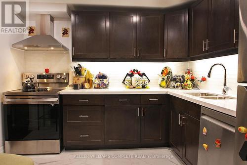 209 - 145 Hillcrest Avenue, Mississauga, ON - Indoor Photo Showing Kitchen With Double Sink