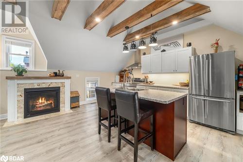 Carriage House Loft Apartment - 149 Bridge Street E, Belleville, ON - Indoor Photo Showing Kitchen With Fireplace