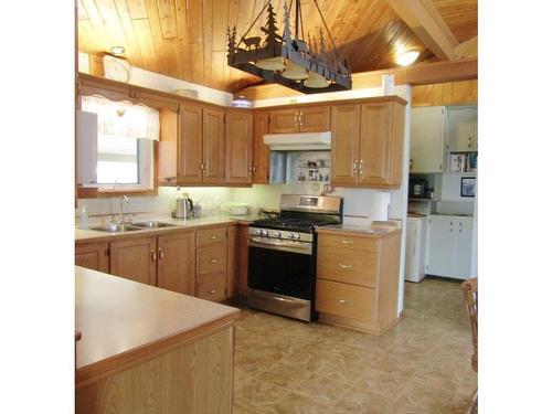 689 Bears Pass Road, Rainy Lake, ON - Indoor Photo Showing Kitchen With Double Sink