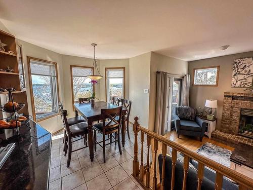 1314 Beach Road, Kenora, ON - Indoor Photo Showing Dining Room With Fireplace