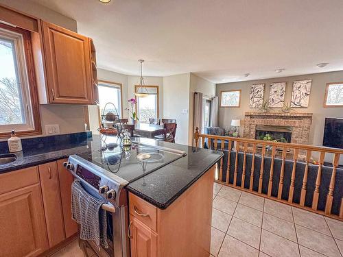 1314 Beach Road, Kenora, ON - Indoor Photo Showing Kitchen With Fireplace