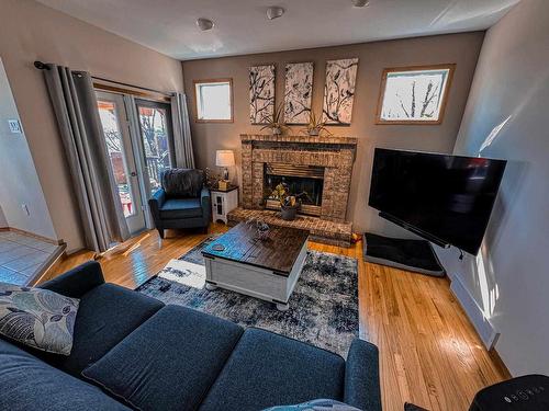 1314 Beach Road, Kenora, ON - Indoor Photo Showing Living Room With Fireplace