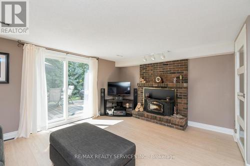 4 Sophia Street, Brampton, ON - Indoor Photo Showing Living Room With Fireplace
