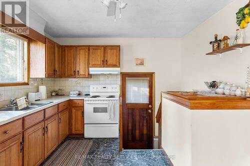 126 Woodward Avenue, Tiny, ON - Indoor Photo Showing Kitchen With Double Sink