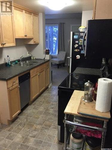 3822 Castle Road, Regina, SK - Indoor Photo Showing Kitchen With Double Sink