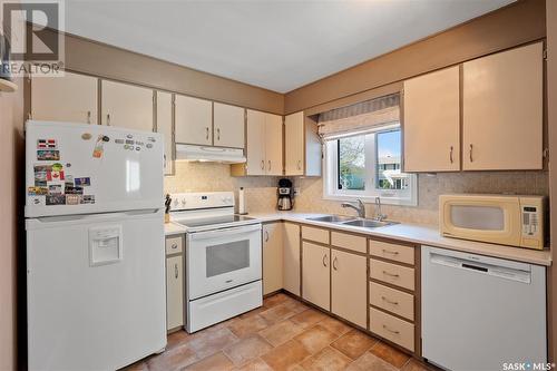 57 Clark Crescent, Saskatoon, SK - Indoor Photo Showing Kitchen With Double Sink