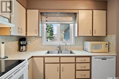 57 Clark Crescent, Saskatoon, SK - Indoor Photo Showing Kitchen With Double Sink
